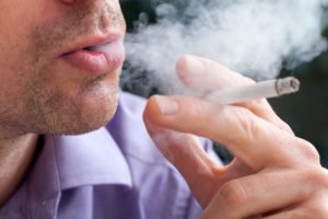 man breathing out smoke e1518107125302 300x200 1